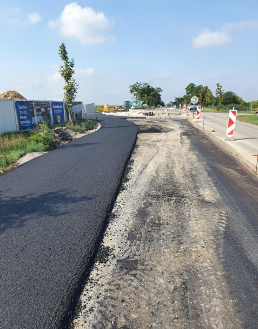Strojová pokládka hutněné asfaltové směsi – výstavba a rekonstrukce dopravních staveb